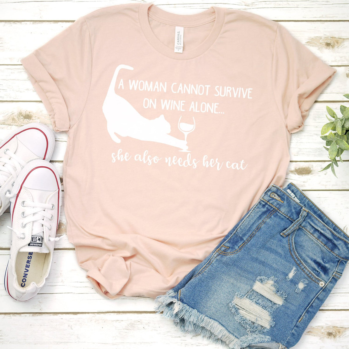 A Woman Cannot Survive on Wine Alone, She also Needs her Cat - Short Sleeve Tee Shirt