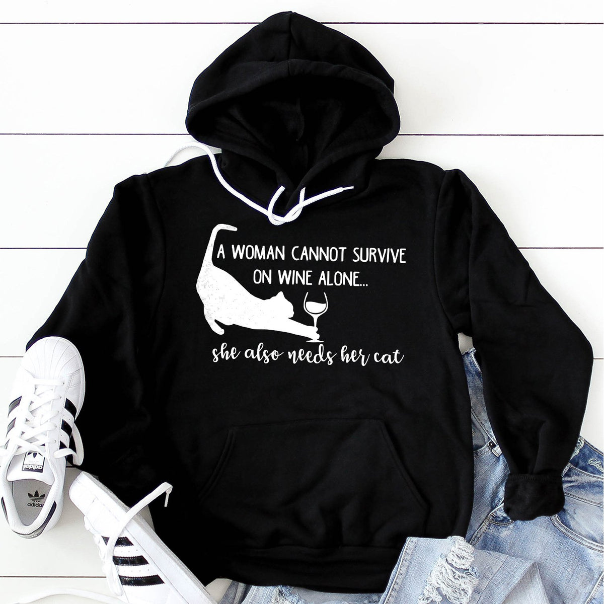 A Woman Cannot Survive on Wine Alone, She also Needs her Cat - Hoodie Sweatshirt