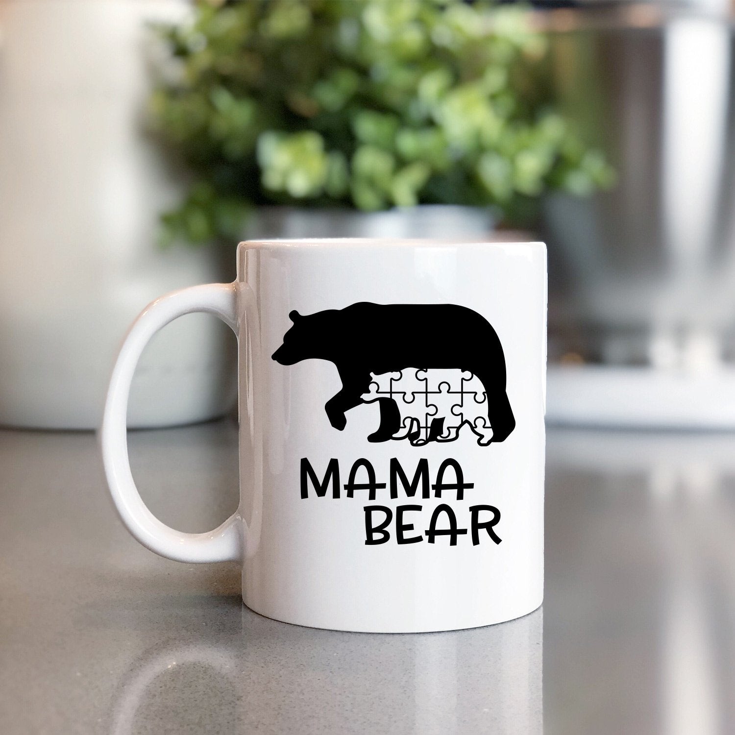 https://www.berkelyrosecollection.com/cdn/shop/products/Coffee_Mug_Table_Image_1_Autism_Mama_Bear_And_Cub_5000x.jpg?v=1619105761