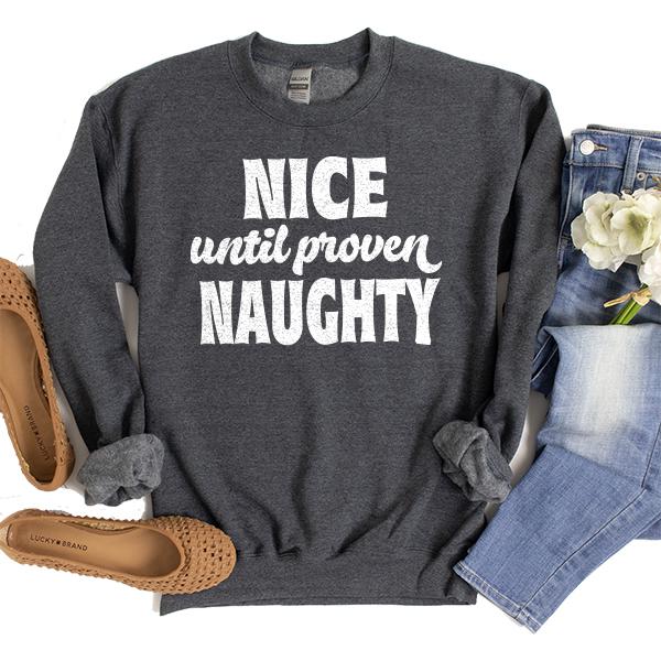 Nice Until Proven Naughty - Long Sleeve Heavy Crewneck Sweatshirt