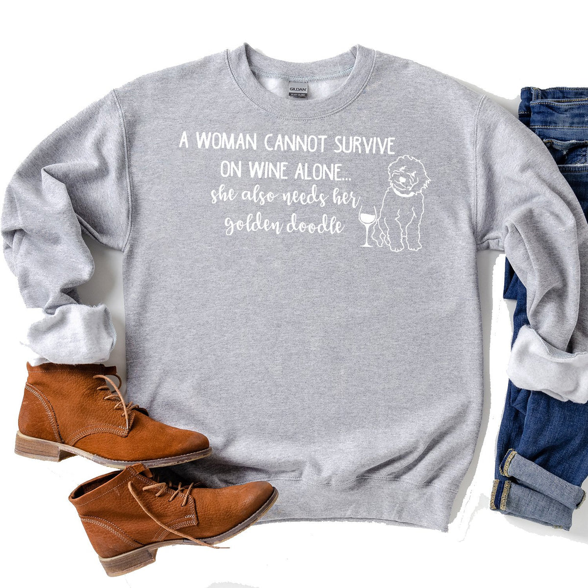 A Woman Cannot Survive on Wine Alone, She also Needs her Golden Doodle - Long Sleeve Heavy Crewneck Sweatshirt