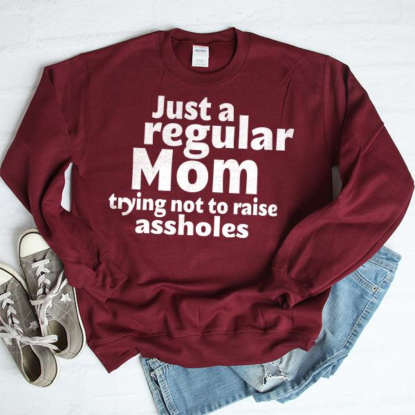 Just A Regular Mom Trying Not To Raise Assholes - Long Sleeve Heavy Crewneck Sweatshirt