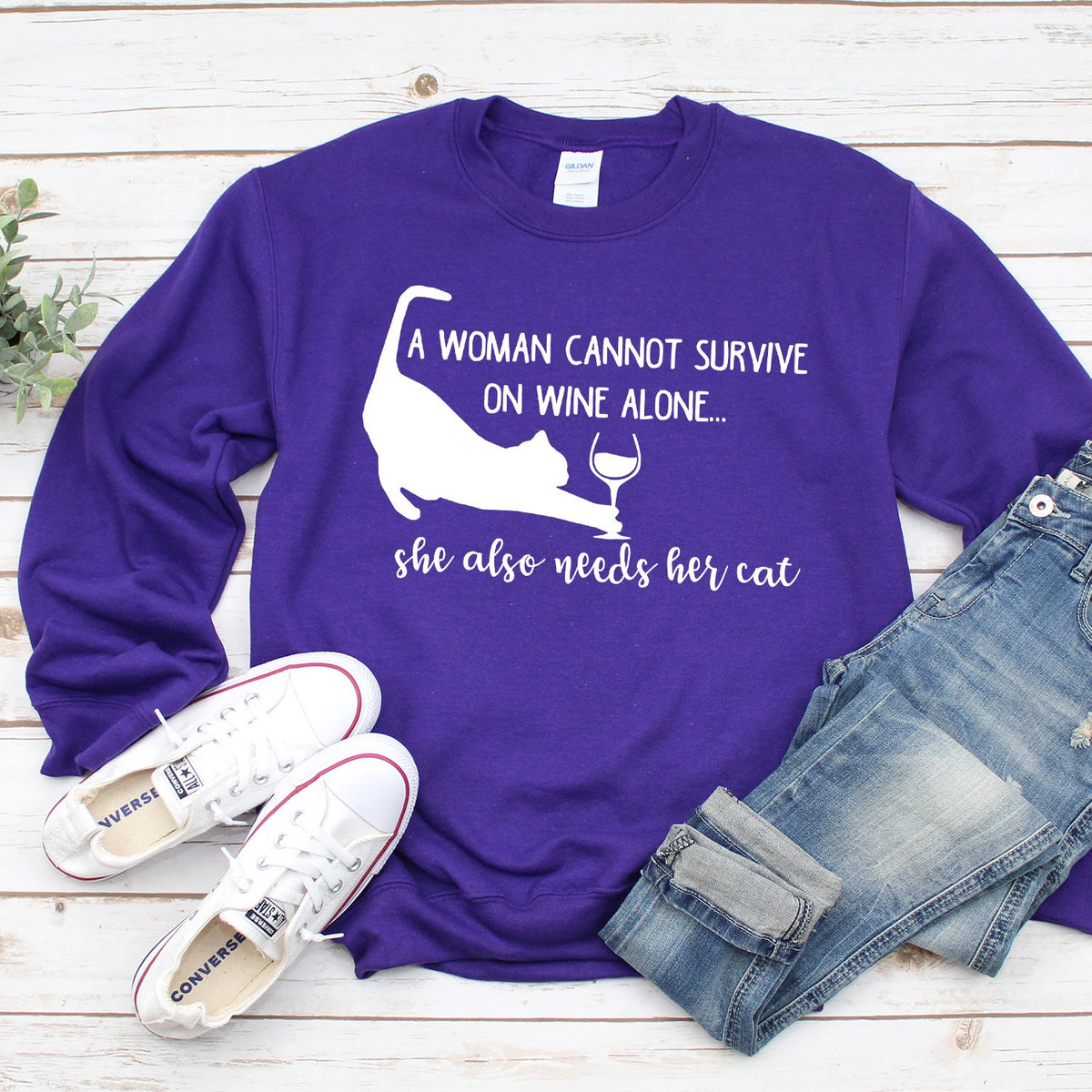 A Woman Cannot Survive on Wine Alone, She also Needs her Cat - Long Sleeve Heavy Crewneck Sweatshirt