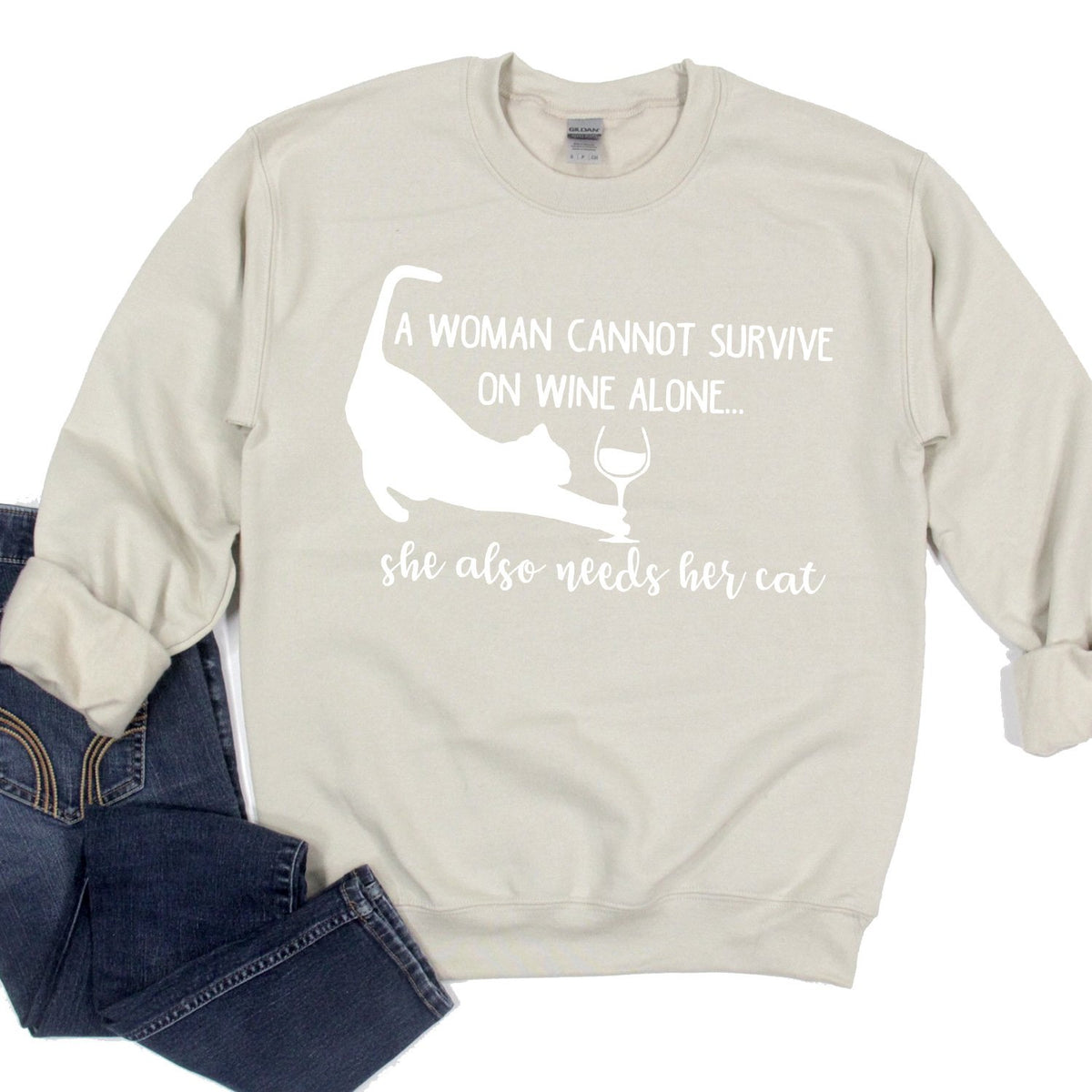 A Woman Cannot Survive on Wine Alone, She also Needs her Cat - Long Sleeve Heavy Crewneck Sweatshirt