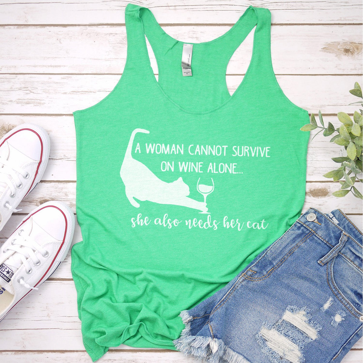 A Woman Cannot Survive on Wine Alone, She also Needs her Cat - Tank Top Racerback