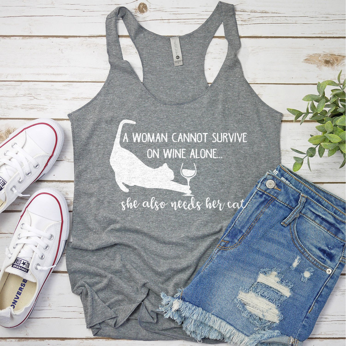 A Woman Cannot Survive on Wine Alone, She also Needs her Cat - Tank Top Racerback