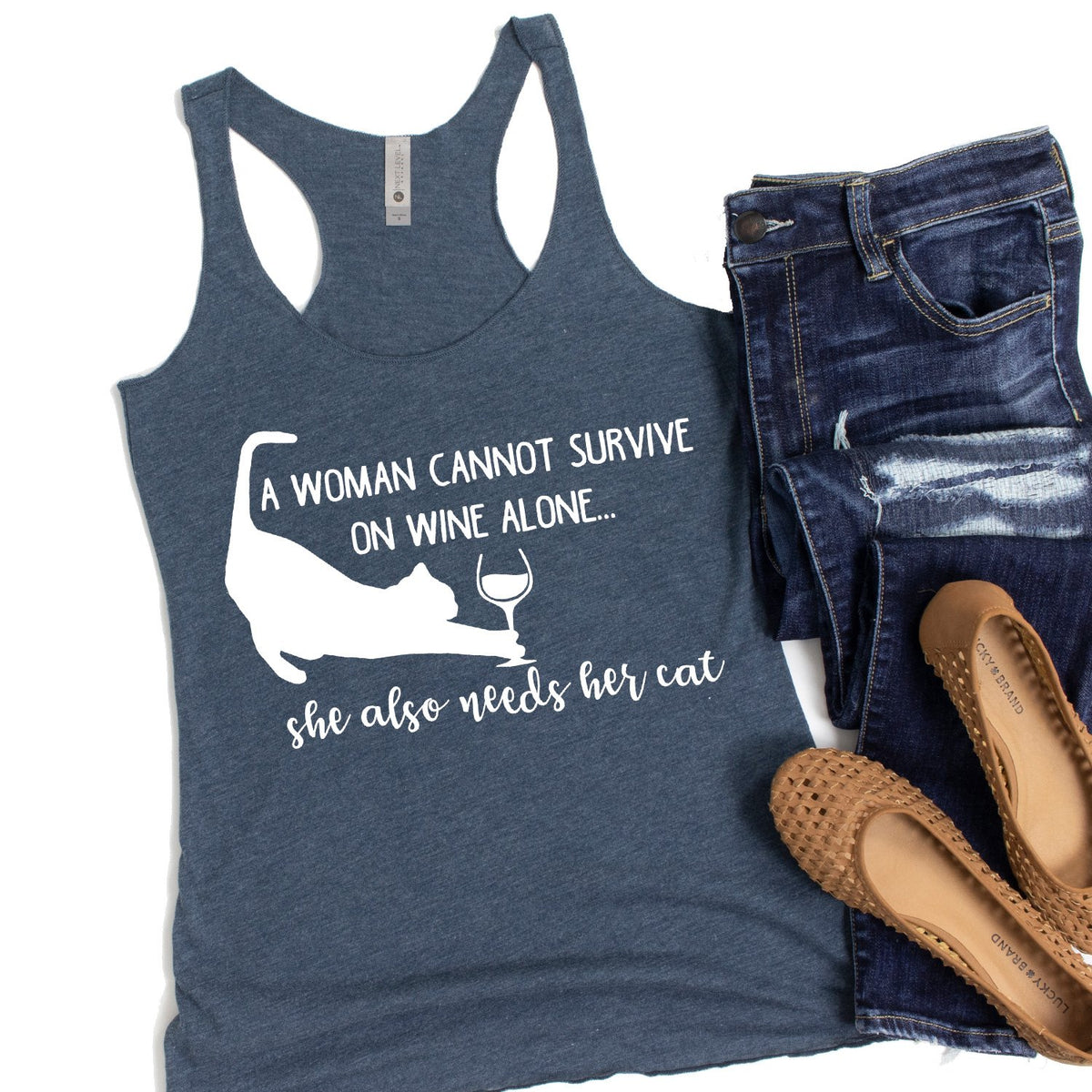 A Woman Cannot Survive on Wine Alone, She also Needs her Cat - Tank Top Racerback