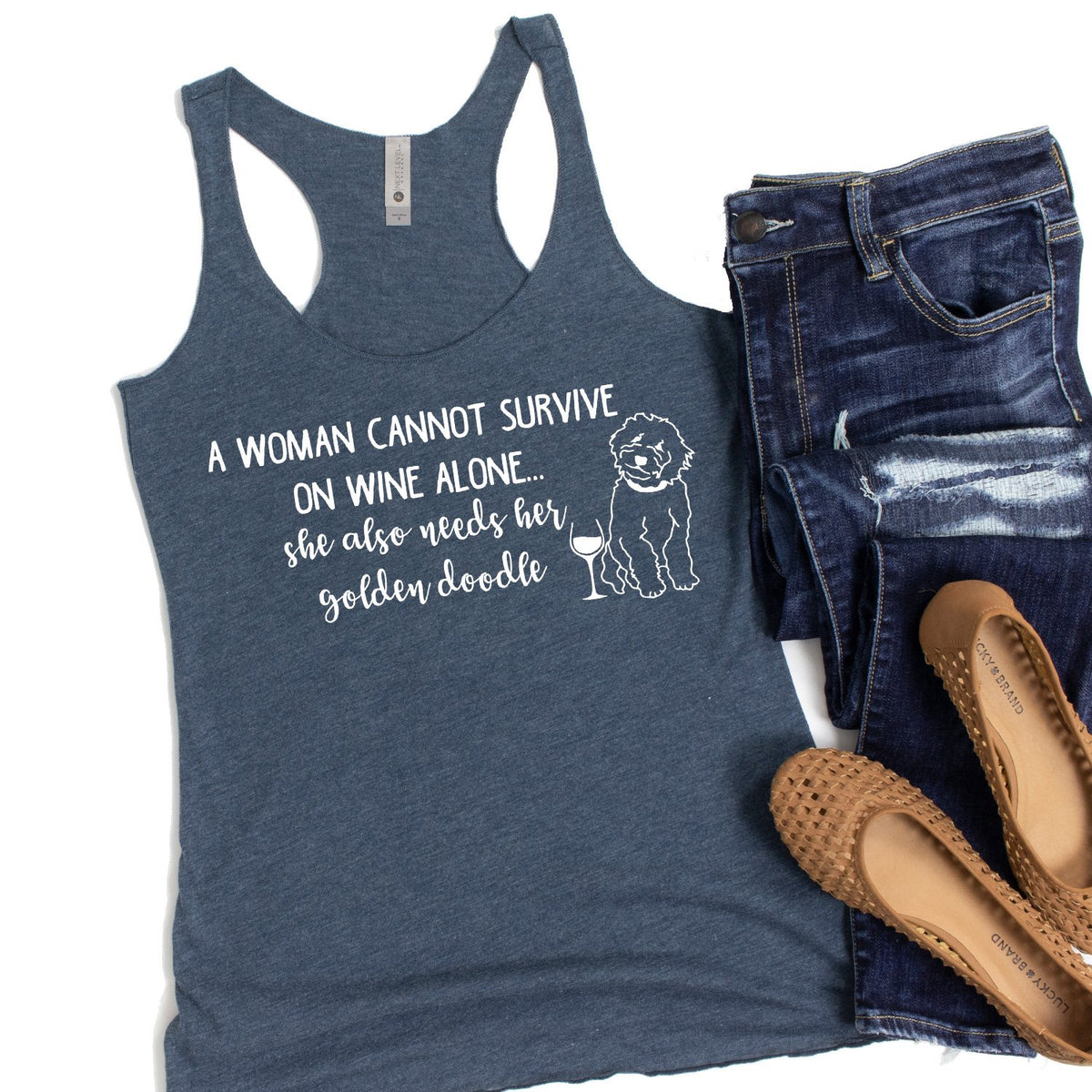 A Woman Cannot Survive on Wine Alone, She also Needs her Golden Doodle - Tank Top Racerback