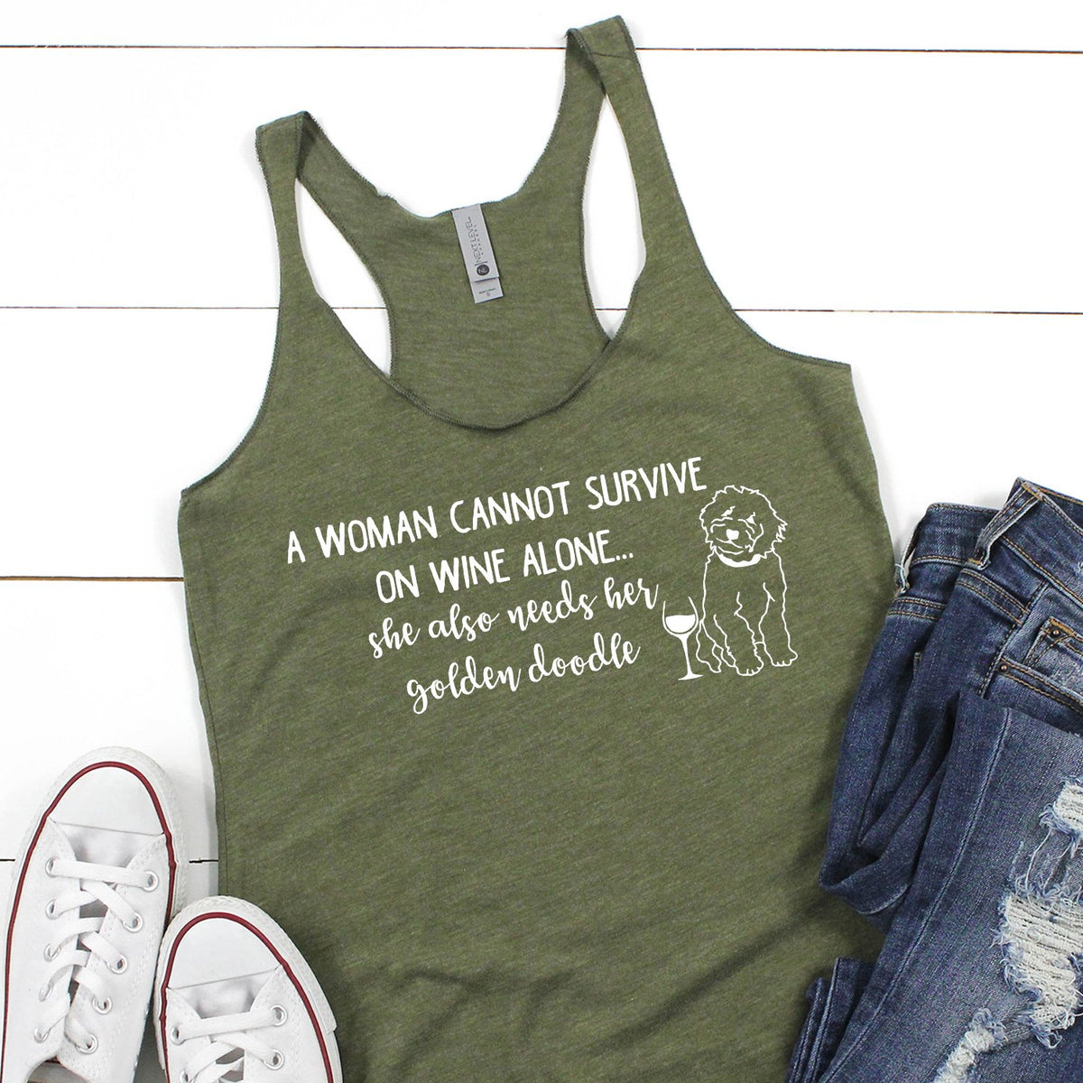 A Woman Cannot Survive on Wine Alone, She also Needs her Golden Doodle - Tank Top Racerback