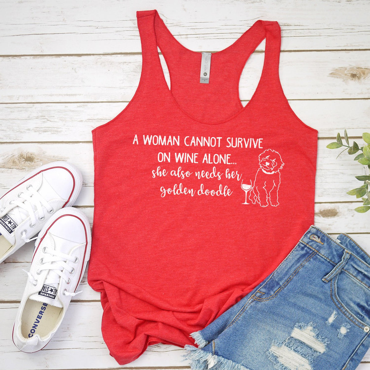 A Woman Cannot Survive on Wine Alone, She also Needs her Golden Doodle - Tank Top Racerback