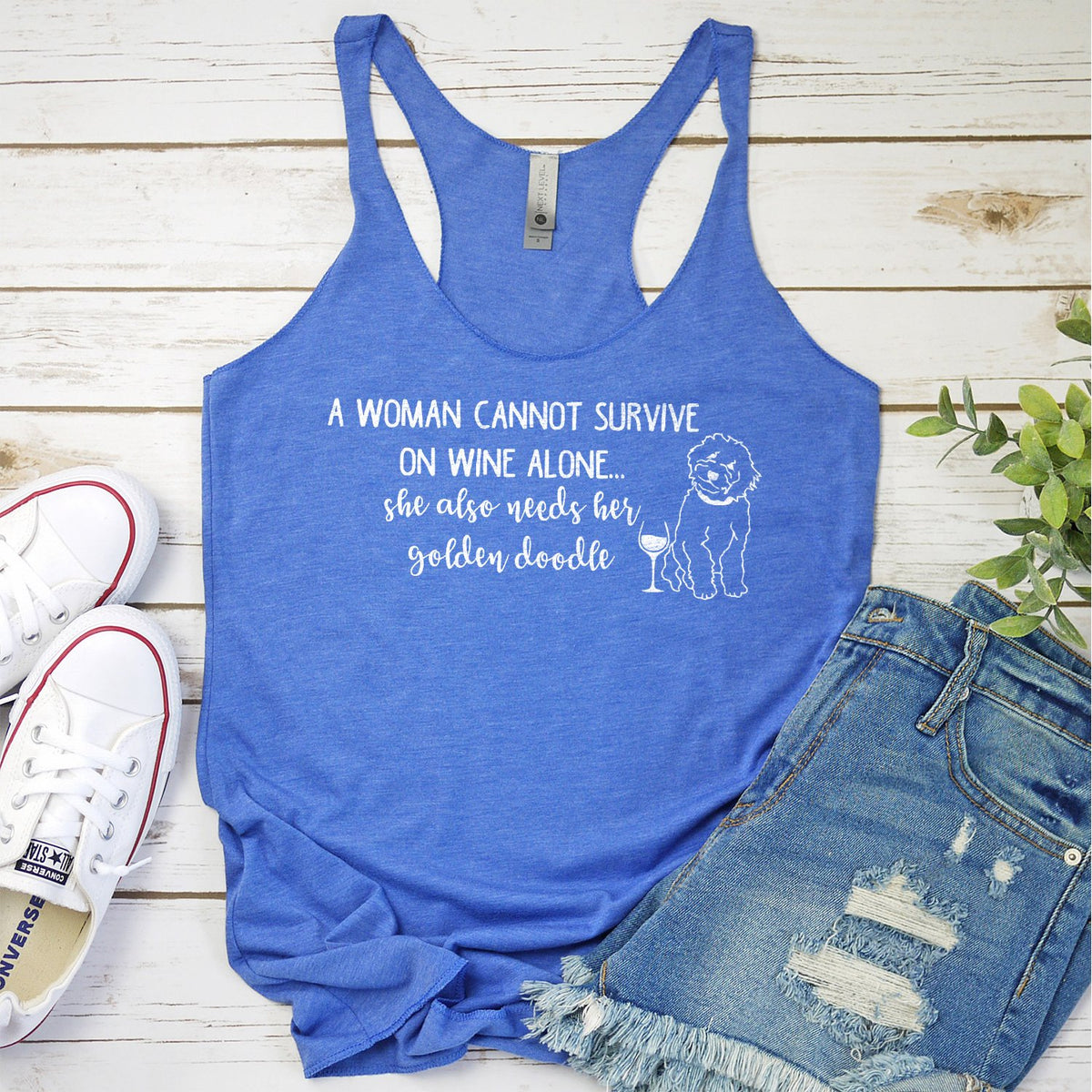 A Woman Cannot Survive on Wine Alone, She also Needs her Golden Doodle - Tank Top Racerback